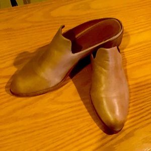 Fry leather mules.